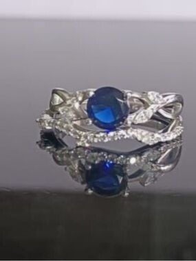 Sterling Sapphire-Style Twisted Halo Ring in Deep Blue